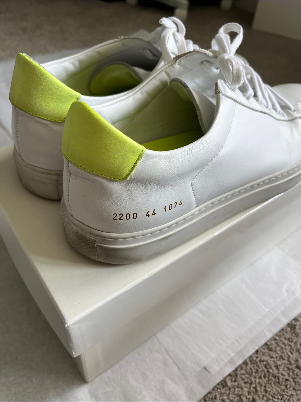Men's Common Projects white leather sneaker with neon yellow collar